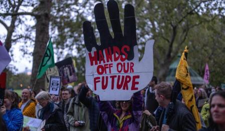 LONDON, ENGLAND - OCTOBER 19: Climate protesters take part in a 'Festival of Resistance' march on October 19, 2023 in London, England. Extinction Rebellion (XR) activists are marching from Marble Arch to Wellington Arch, demanding accountability from the fossil fuel industry for their immense profits at the expense of the planet. (Photo by Carl Court/Getty Images)