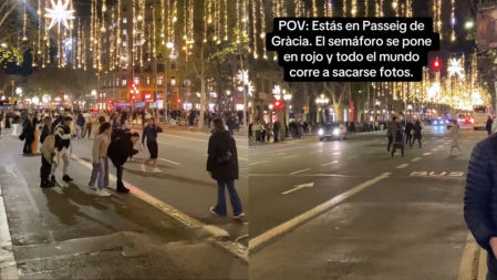 En un insólito espectáculo urbano, ciudadanos aprovechan el semáforo en rojo en Passeig de Gràcia de Barcelona para inmortalizarse frente a las deslumbrantes luces navideñas