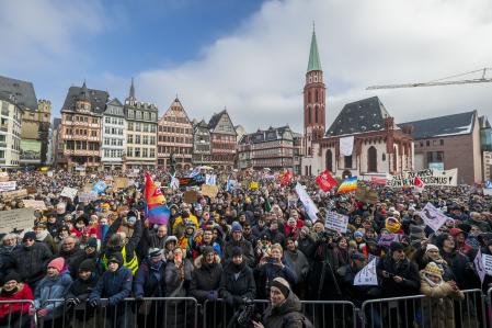 FRANKFURT AM MAIN, GERMANY - JANUARY 20: People gather to protest against the far-right Alternative for Germany (AfD) political party on January 20, 2024 in Frankfurt, Germany. According to the organizers, up to 50.000 people took part in the demonstration on Roemerberg, Paulsplatz and the Zeil shopping street. Protests against the AfD and for defending democracy have been taking place across Germany over the past week following the recent revelation that high-ranking AfD members met with far-right extremists at a villa in Potsdam last November. According to the investigative media group Correctiv, whose members filmed and recorded portions of the gathering, politicians from the AfD, including AfD Bundestag parliamentarian Gerrit Huy as well as Roland Hartwig, a now former advisor to AfD co-leader Alice Weidel, and the German Christian Democrats (CDU)-linked Werteunion met with far-right extremists, including Austrian far-right activist Martin Sellner, and supporters of far-right causes, including Hans-Christian Limmer, founder of the Backwerk nationwide bakery chain. Participants at the meeting reportedly discussed how to possibly introduce legislative measures to enable the mass expulsion of immigrants from Germany, as well as German citizens with immigrant roots and German citizens who have helped refugees. (Photo by Thomas Lohnes/Getty Images)
