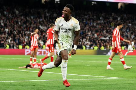 MADRID, SPAIN - JANUARY 21: Vinicius Junior of Real Madrid celebrates scoring his team's second goal during the LaLiga EA Sports match between Real Madrid CF and UD Almeria at Estadio Santiago Bernabeu on January 21, 2024 in Madrid, Spain. (Photo by Florencia Tan Jun/Getty Images) *** BESTPIX ***