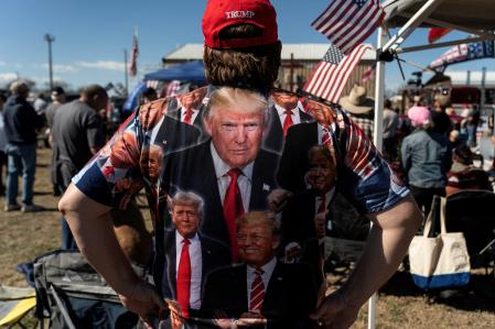 A participant of 'Take Back Our Border' trucker convoy rally against migrants crossing from Mexico, wears a Trump t-shirt during the event in Quemado, Texas, U.S., February 3, 2024. REUTERS/Go Nakamura TPX IMAGES OF THE DAY
