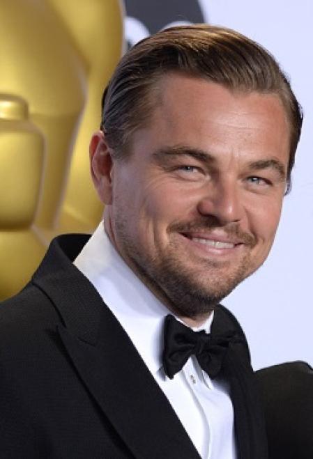 Actor Leonardo DiCaprio, winner of the award for best actor in a leading role for “The Revenant”, left, and Alejandro G. Iñarritu, winner of the award for best director for “The Revenant”, pose in the press room with their awards at the Oscars on Sunday, Feb. 28, 2016, at the DolbyTheatre in Los Angeles.