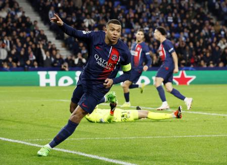 Soccer Football - Champions League - Round of 16 - Second Leg - Real Sociedad v Paris St Germain - Reale Arena, San Sebastian, Spain - March 5, 2024 Paris St Germain's Kylian Mbappe celebrates scoring their second goal REUTERS/Vincent West