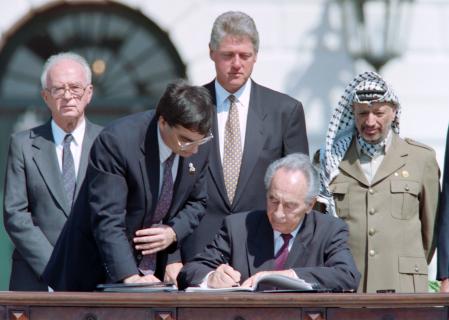 (FILES) This file photo taken on September 13, 1993 shows Israeli Foreign Minister Shimon Peres (C) signing the historic Israel-PLO Oslo Accords on Palestinian autonomy in the occupied territories in a ceremony at the White House in Washington, D.C. as (from L to R) Israeli Prime Minister Yitzhak Rabin, unidentified aide, US President Bill Clinton and PLO Chairman Yasser Arafat look on.
Former president and Nobel Peace Prize winner Shimon Peres, the last of Israel's founding fathers, was in critical condition on September 14, 2016 after suffering a major stroke and doctors were treating him in intensive care. The last of Israel's founding fathers, Peres has held nearly every major office in the country, including prime minister twice and president, a mostly ceremonial post, from 2007 to 2014. / AFP PHOTO / J. DAVID AKE