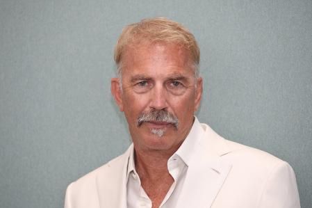 Kevin Costner receives the Order of Arts and Letters at the 77th annual Cannes Film Festival at Palais des Festivals on May 19, 2024 in Cannes, France