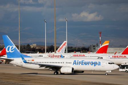 FILE PHOTO: Iberia and Air Europa planes parked at Adolfo Suarez Barajas airport during the COVID-19 pandemic in Madrid, Spain, December 15, 2020. REUTERS/Susana Vera/File Photo