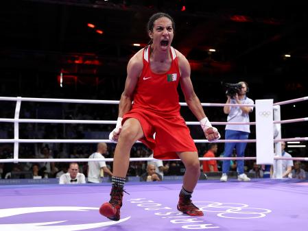 PARIS, FRANCE - AUGUST 03: Imane Khelif of Team Algeria celebrates victory against Anna Luca Hamori of Team Hungary after the Women's 66kg Quarter-final round match on day eight of the Olympic Games Paris 2024 at North Paris Arena on August 03, 2024 in Paris, France. (Photo by Richard Pelham/Getty Images)