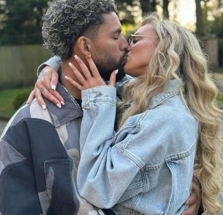 Lehmann y Luiz besándose