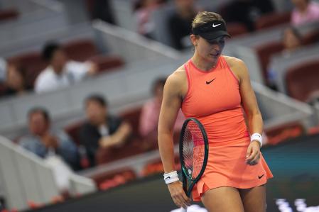 Tennis - China Open - China National Tennis Center, Beijing, China - October 5, 2024 Spain's Paula Badosa reacts during her semi final match against Coco Gauff of the U.S. REUTERS/Florence Lo