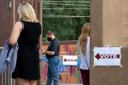 TEMPE, AZ - NOVEMBER 03: Voters wait to cast their ballots at Marquee Theatre on November 3, 2020 in Tempe, Arizona. After a record-breaking early voting turnout, Americans head to the polls on the last day to cast their vote for incumbent U.S. President Donald Trump or Democratic nominee Joe Biden in the 2020 presidential election. Courtney Pedroza/Getty Images/AFP == FOR NEWSPAPERS, INTERNET, TELCOS & TELEVISION USE ONLY ==