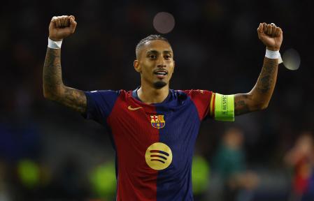 Soccer Football - Champions League - FC Barcelona v Bayern Munich - Estadi Olimpic Lluis Companys, Barcelona, Spain - October 23, 2024 FC Barcelona's Raphinha celebrates scoring their third goal REUTERS/Albert Gea