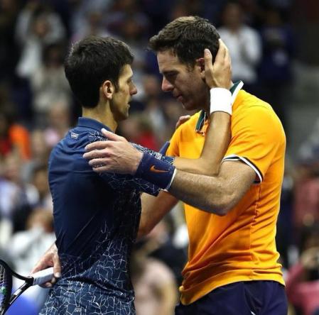 Del Potro y Djokovic en la red tras uno de sus partidos