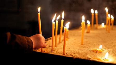 Lit Prayer Candles in a Church for Wishes and Prayers

This tranquil video captures the gentle glow of prayer candles inside a church. The candles, lit by visitors, symbolize their wishes and prayers, creating a serene and reflective atmosphere. The warm candlelight illuminates the space, fostering a sense of peace and devotion. The video showcases the spiritual practice of lighting candles as an act of faith and hope, inviting viewers to share in this sacred tradition.