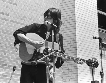 Gram Parsons performs with The Flying Burrito Brothers during a concert at Queens College in New York. (Photo by Harvey L. Silver/Corbis via Getty Images)