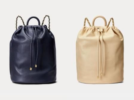 Mochila de piel tipo saco Izzie en azul marino con cierre de cordón y botón imantado