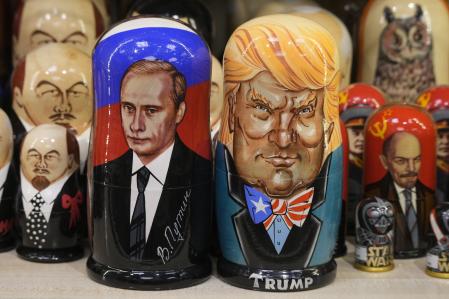 Traditional Russian wooden dolls called Matryoshka depicting Russian President Vladimir Putin, front left, and US President-elect Donald Trump, front right, are displayed for sale at a souvenir shop in St. Petersburg, Russia, Monday, Jan. 20, 2025. (AP Photo/Dmitri Lovetsky)