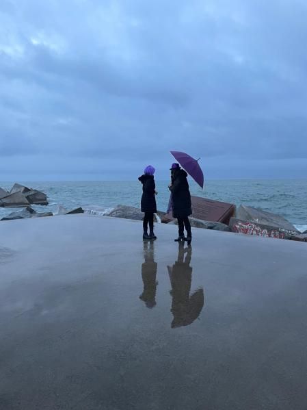 Escena fotográfica en la quedada del 8-M en el espigón de la Mar Bella.