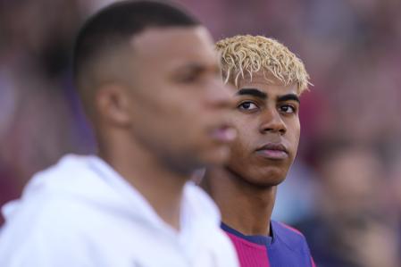 Lamine Yamal right winger of Barcelona and Spain and Kylian Mbappe centre-forward of Real Madrid and France prior the La Liga match between FC Barcelona and Real Madrid at Estadi Olimpic Lluis Companys on May 11, 2025 in Barcelona, Spain. (Photo by Jose Breton/Pics Action/NurPhoto via Getty Images)