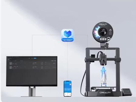 Impresora 3D conectada a un ordenador y a un teléfono móvil.