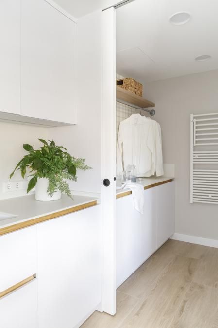 Zona de lavandería del piso grande reformado por Pia Capdevila Interiorismo