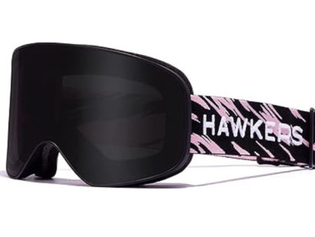 Gafas de esquí Hawkers Ski Snowboard con montura negra mate, detalles rosa y lente negra ZEISS con protección UV.