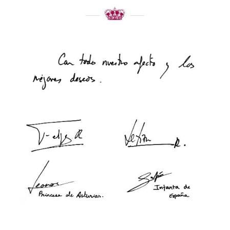 Felicitación y firmas de los Reyes y sus hijas