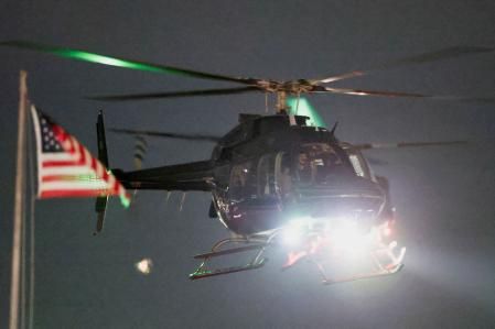 One of the helicopters carrying Venezuela's President Nicolas Maduro and his wife Cilia Flores arrives after they were captured overnight in Venezuela by U.S. forces, at the Westside Heliport in New York City, U.S. January 3, 2026.  REUTERS/Jeenah Moon
