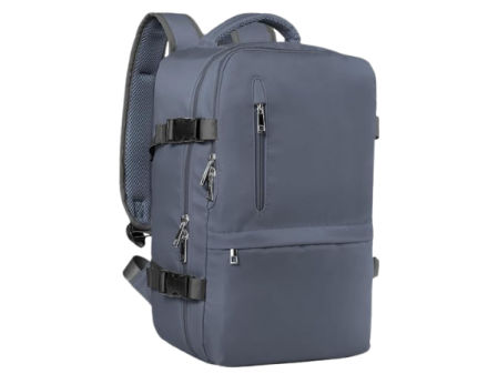 Mochila de viaje compacta de cabina en color gris, con diseño rectangular, múltiples cremalleras y correas laterales de ajuste