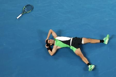Tennis - Australian Open - Melbourne Park, Melbourne, Australia - February 1, 2026 Spain's Carlos Alcaraz celebrates after winning the Australian Open men's singles against Serbia's Novak Djokovic. Alcaraz becomes the youngest man to win all four grand slam titles. REUTERS/Hollie Adams