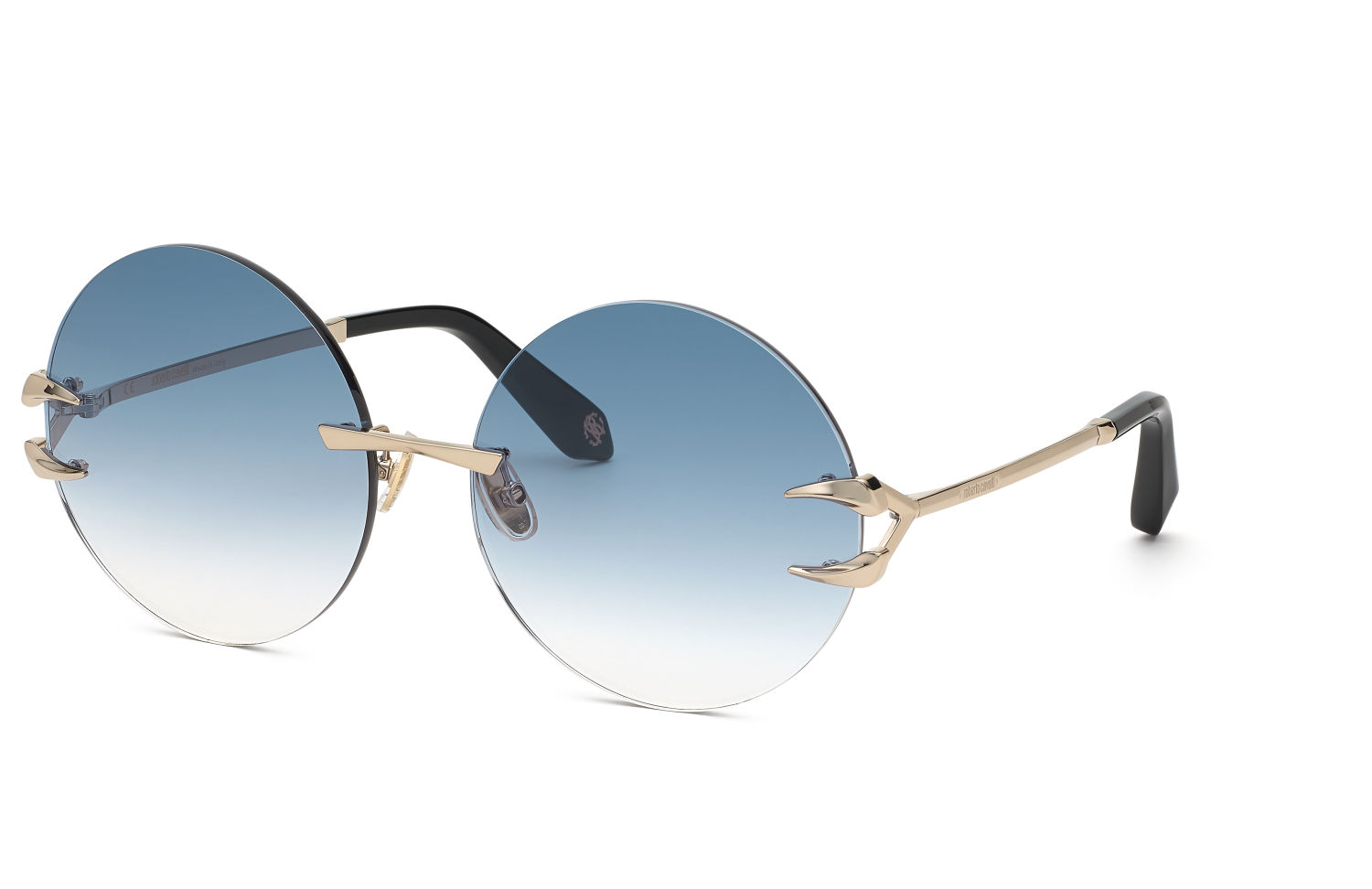 La esencia intrépida de Roberto Cavalli se imprime en su modelo Fang de lentes ovaladas con los emblemáticos dientes de tigre de la firma enmarcando el atrevido diseño