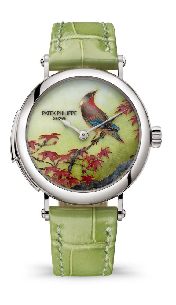Patek Philippe se compromete a preservar todos los oficios de alto artesonado vinculados desde hace más de cuatro siglos a la decoración de los relojes, así nace el reloj Bird on a Red Maple (7000/50G-011)