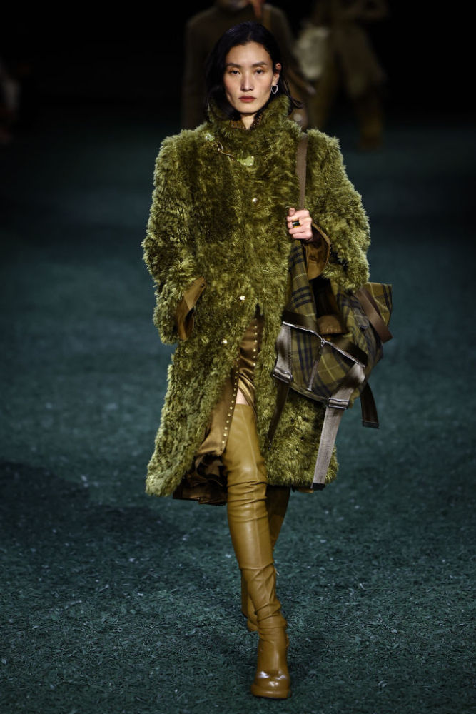 A model presents a creation during a catwalk presentation for British fashion house Burberry's Autumn/Winter 2024 collection, at London Fashion Week in London, on February 19, 2024. (Photo by HENRY NICHOLLS / AFP)