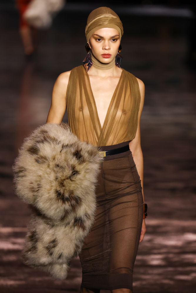 PARIS, FRANCE - FEBRUARY 27: (EDITORIAL USE ONLY - For Non-Editorial use please seek approval from Fashion House) A model walks the runway during the Saint Laurent Womenswear Fall/Winter 2024-2025 show as part of Paris Fashion Week on February 27, 2024 in Paris, France. (Photo by Marc Piasecki/WireImage)