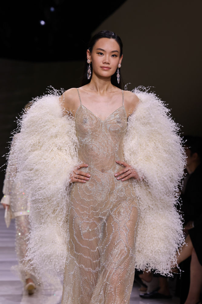 PARIS, FRANCE - MARCH 04: (EDITORIAL USE ONLY - For Non-Editorial use please seek approval from Fashion House) A model walks the runway during the Stella McCartney Womenswear Fall/Winter 2024-2025 show as part of Paris Fashion Week on March 04, 2024 in Paris, France. (Photo by Pietro D'Aprano/Getty Images)