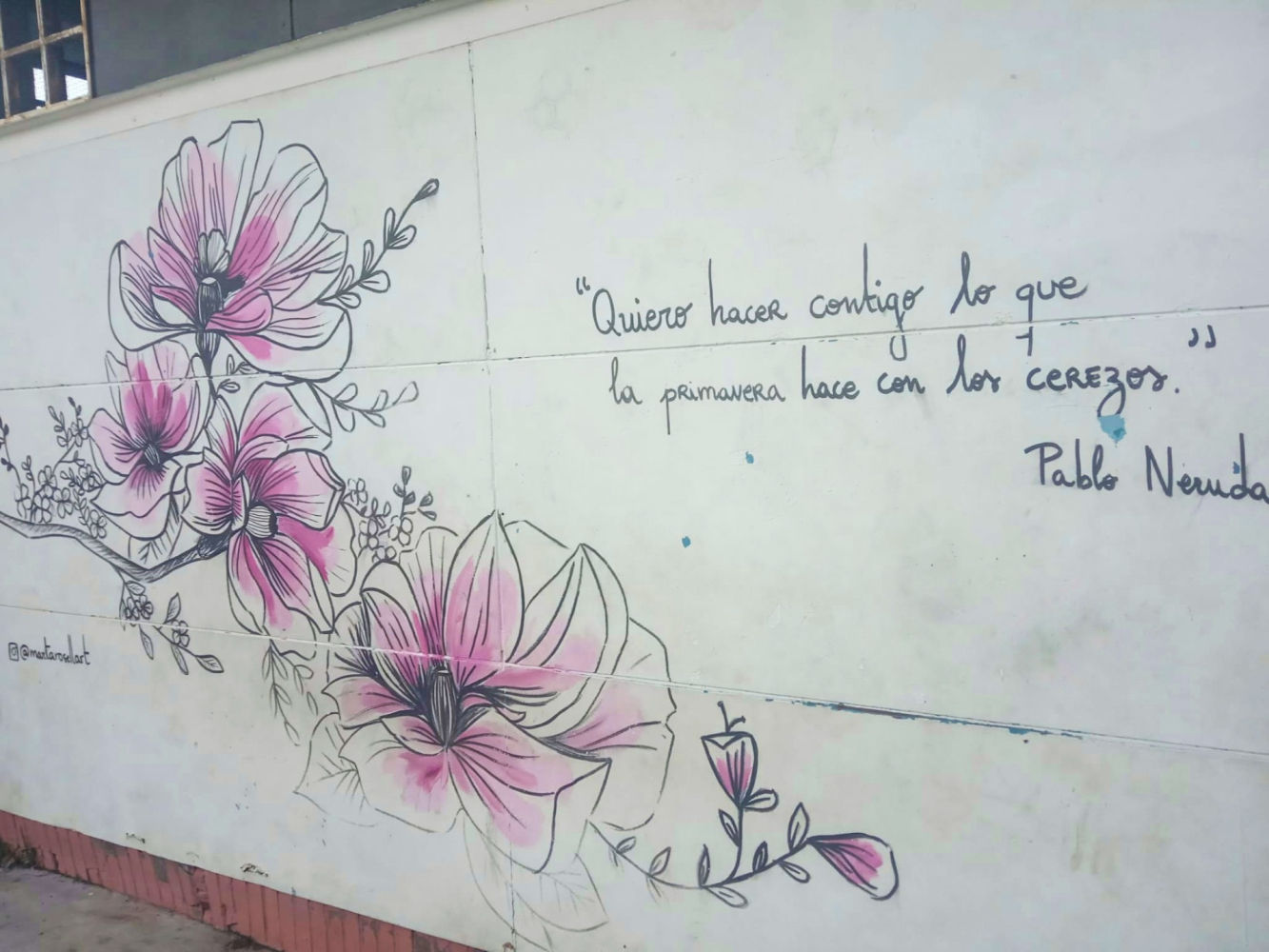 Pablo Neruda en un poema de Street Art de Cornellà.