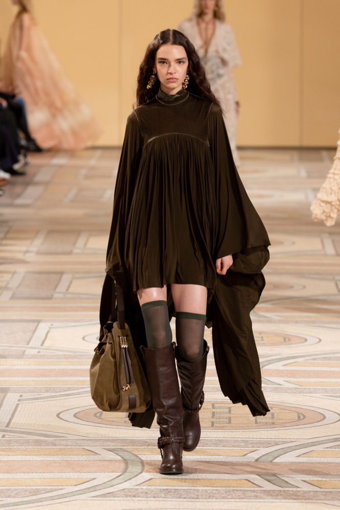 PARIS, FRANCE - MARCH 11: (EDITORIAL USE ONLY - For Non-Editorial use please seek approval from Fashion House) A model walks the runway during the Miu Miu Womenswear Fall/Winter 2025-2026 show as part of Paris Fashion Week at Palais d'Iena on March 11, 2025 in Paris, France. (Photo by Victor Boyko/Getty Images)