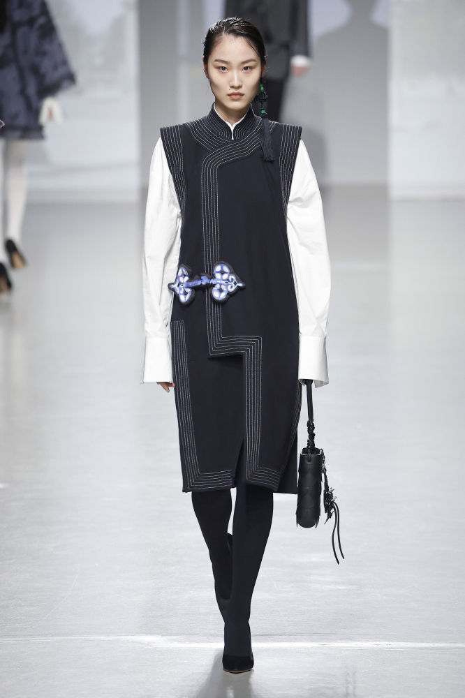 PARIS, FRANCE - MARCH 2: (EDITORIAL USE ONLY - For Non-Editorial use please seek approval from Fashion House) A model walks the runway during the Vivienne Tam Womenswear Fall/Winter 2024-2025 show as part of Paris Fashion Week on March 2, 2024 in Paris, France. (Photo by Estrop/Getty Images)