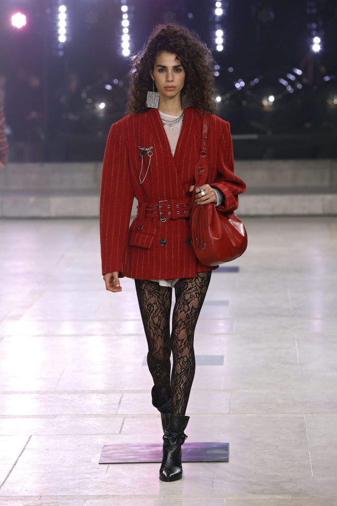 MILAN, ITALY - MARCH 02: A model walks the runway at the Twinset fashion show during the Milan Fashion Week - Womenswear Fall/Winter 2025/2026 on March 02, 2025 in Milan, Italy. (Photo by Alena Zakirova/Getty Images)