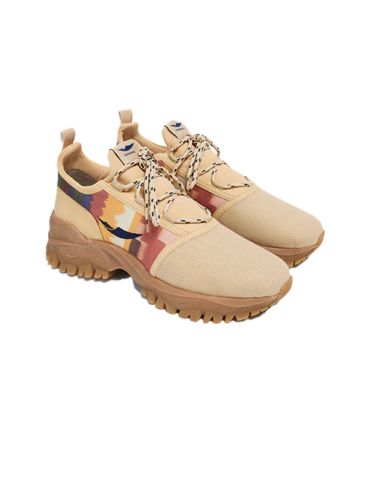 nde Dem son unas zapatillas veganas y sostenibles fabricadas en talleres familiares de Alicante y Portugal,  solidarias con los manteros y sus familias