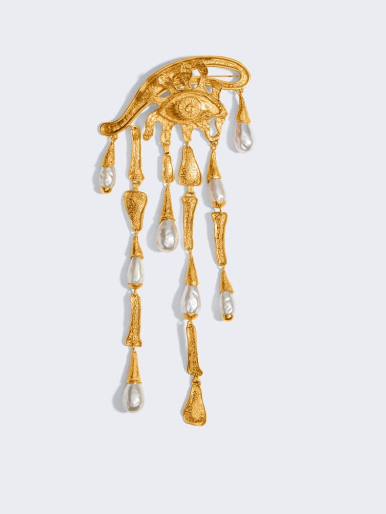 Broche con colgantes de latón dorado y perlas en lágrima de Schiaparelli