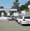 Afghan police check the cars at the entrance gate of Hamid Karzai International Airport in Kabul, Afghanistan August 15, 2021. REUTERS/Stringer