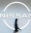 The Nissan Motor Co. logo in a showroom at the company's global headquarters in Yokohama, Japan, on Tuesday, Nov. 2, 2021. As Japan's biggest carmakers report earnings over the next week, strong demand for vehicles is fueling higher profits that will help offset lower sales volumes caused by parts shortages and production cuts. Photographer: Kiyoshi Ota/Bloomberg
