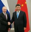 BRASILIA, BRAZIL - NOVEMBER 13: (RUSSIA OUT) Russian President Vladimir Putin (L) greets Chinese President Xi Jinping (R) during their bilateral meeting on November 13, 2019 in Brasilia, Brazil. The leaders of Russia, China, Brazil, India and South Africa have gathered in Brasilia for the BRICS leaders summit. (Photo by Mikhail Svetlov/Getty Images)