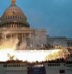 FILE PHOTO: An explosion caused by a police munition is seen while supporters of U.S. President Donald Trump gather in front of the U.S. Capitol Building in Washington, U.S., January 6, 2021. Reuters photographer Leah Millis: 