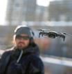 FILE PHOTO: A drone operator flies his drone as Chinese drone maker DJI holds a demonstration to display an app that tracks a drone's registration and owner in Montreal, Canada, November 13, 2019. REUTERS/Christinne Muschi/File Photo