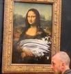 LV_Un visitante del Louvre lanza una tarta a 'La Gioconda'