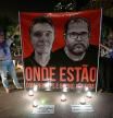 TOPSHOT - Employees of the National Indigenous Foundation protest over missing British journalist Dom Phillips and Brazilian Indigenous affairs specialist Bruno Pereira, in Brasilia, on June 9, 2022. - The family of a British journalist missing in the Amazon urged British and Brazilian authorities in London on Thursday to step up their efforts to find him. Dom Phillips, 57, a regular contributor to The Guardian, and Bruno Pereira, 41, a specialist in indigenous peoples, were reported missing on Sunday after they ventured into the middle of the Amazon rainforest. (Photo by EVARISTO SA / AFP)