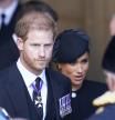 Britain's Prince Harry and Meghan Markle , Duchess of Sussex during transfer of Queen Elizabeth II's remains from BuckinghamPalace to WestminsterHall, London on September 14, 2022.