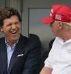 Tucker Carlson con Donald Trump en el torneo Bedminster de golf, en Nueva Jersey, el 31 de julio del 2022