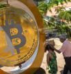 A Bitcoin statue at a plaza in Ilopango, El Salvador, on Wednesday, Feb. 28, 2024. El Salvador leader Nayib Bukele, who was re-elected to a second five year term this month, said on X the government's Bitcoin holdings have risen 40% in value amid the cryptocurrency's rally. Photographer: Camilo Freedman/Bloomberg